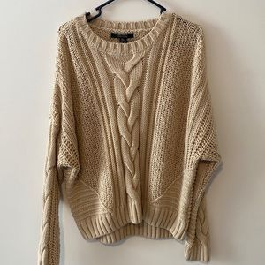 Beige knitted sweater